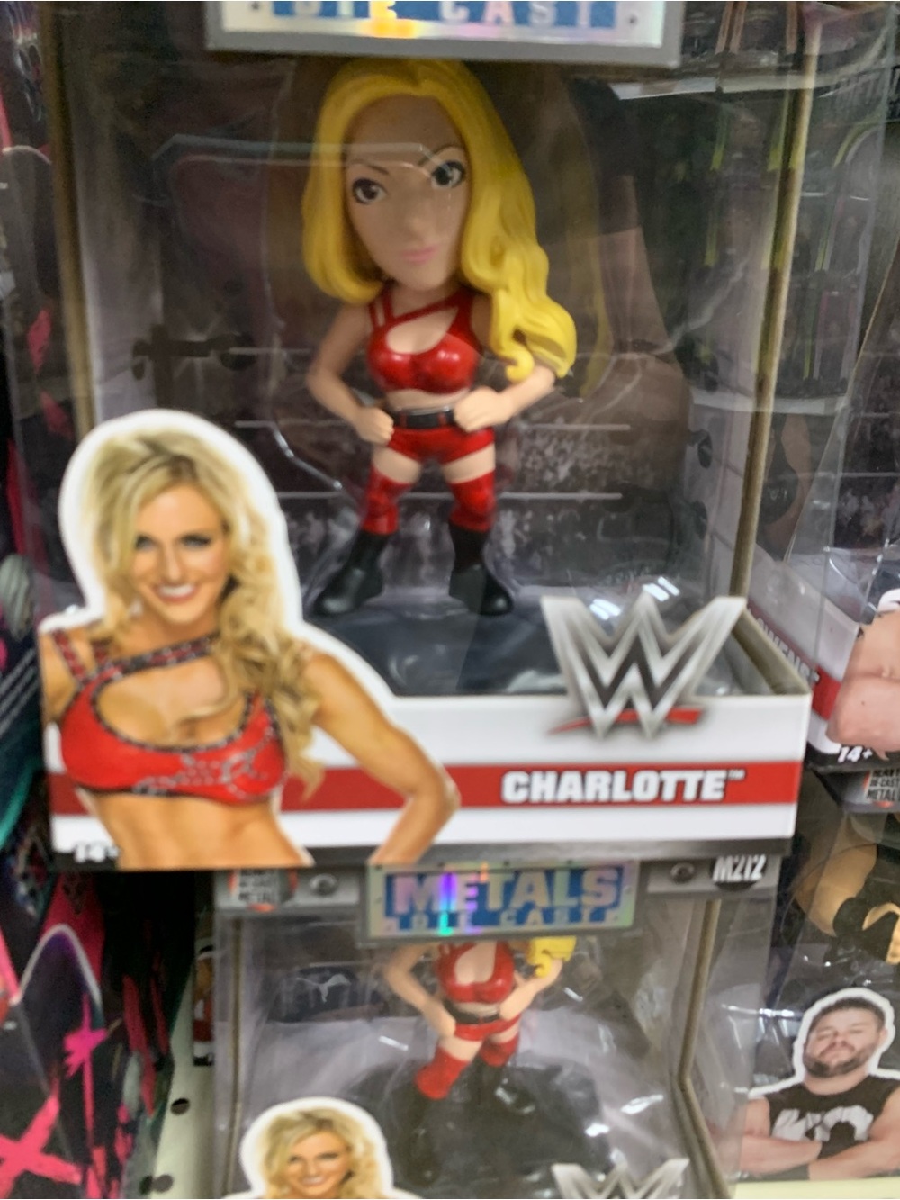 WWE Blonde Female Wrestler Figure in Red and Black Ring Gear